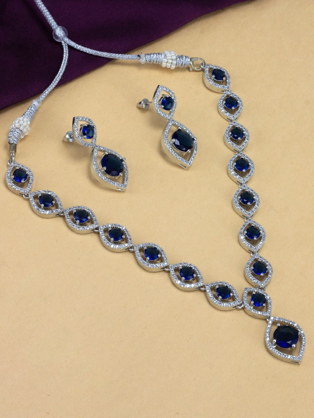 Rhodium-Plated Blue American Diamond Studded Long Necklace & Earrings Set