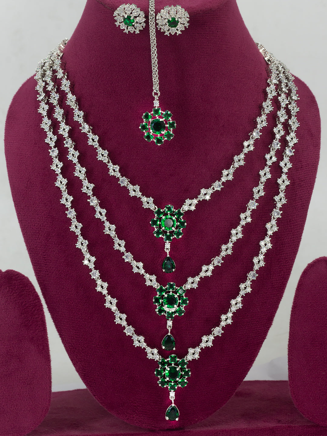 Rhodium Plated Trendy Green Three Layered AD Bridal Jewellery Set With Maangtika