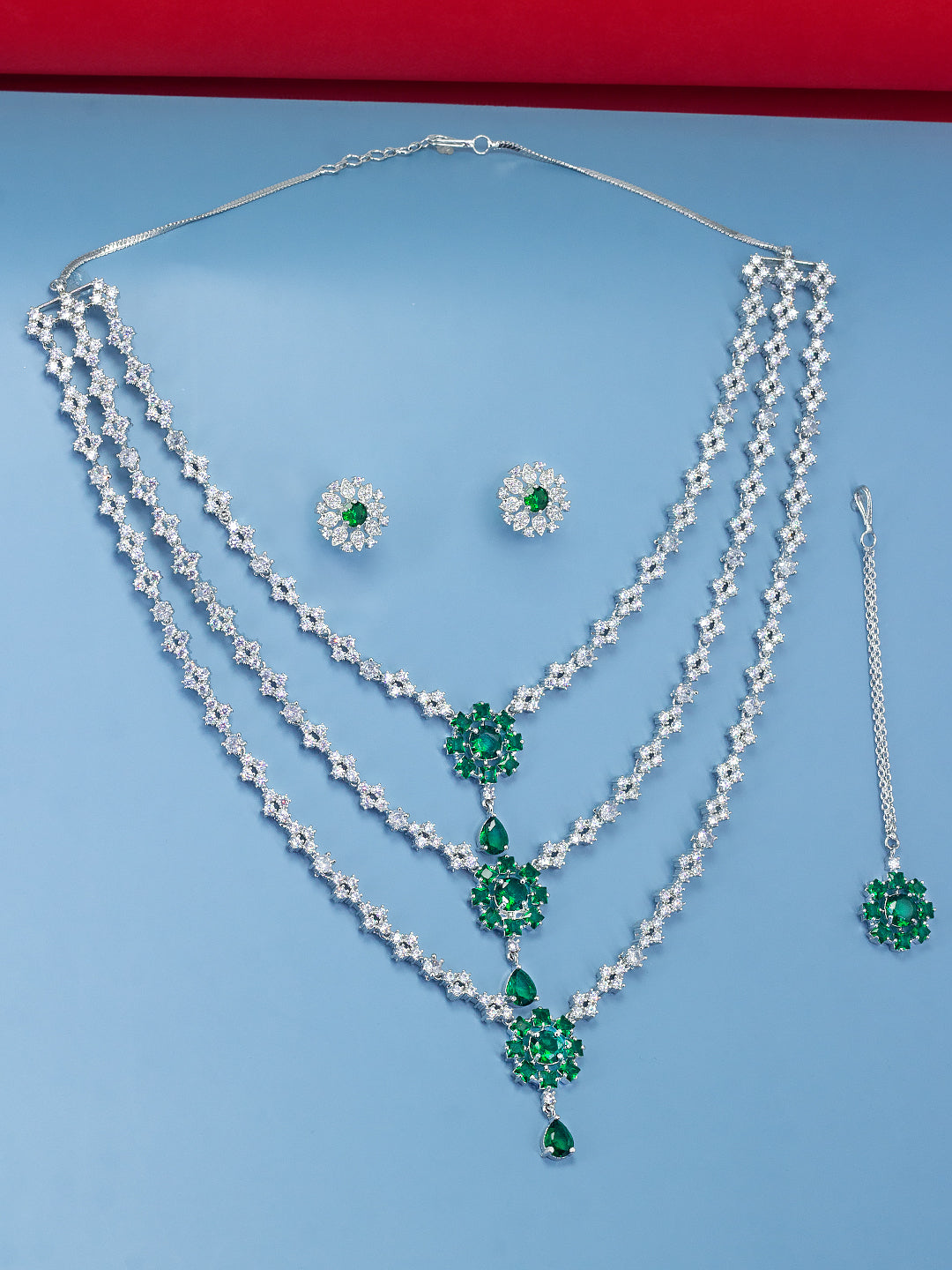 Rhodium Plated Trendy Green Three Layered AD Bridal Jewellery Set With Maangtika