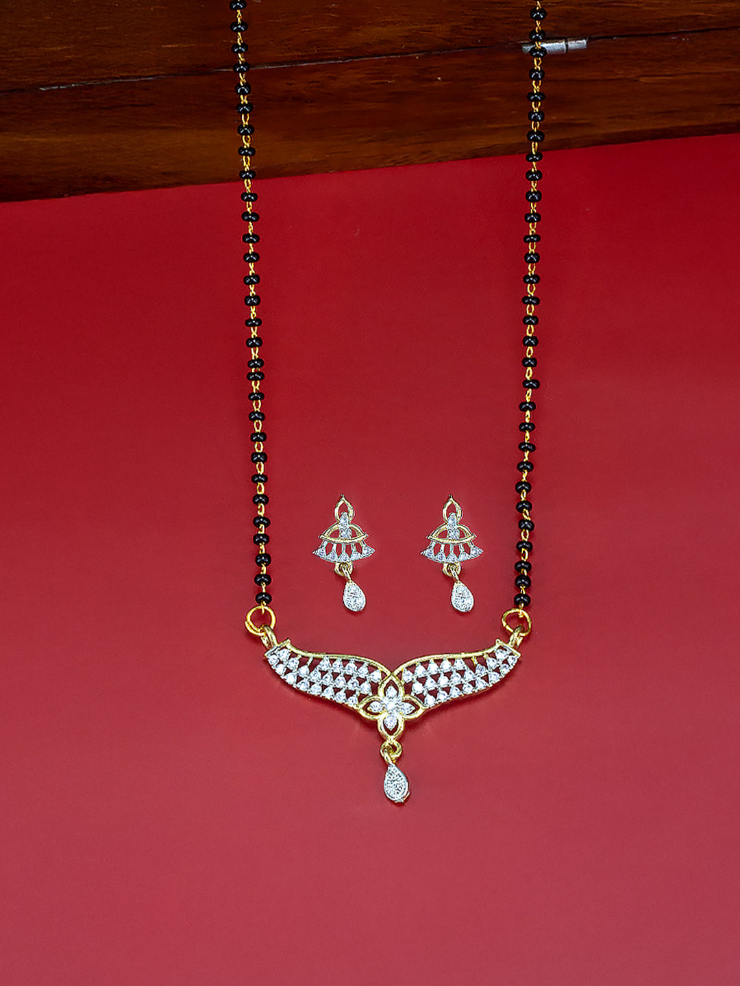 Gold Plated American Diamond & Black Beaded Trendy Mangalsutra With Earrings